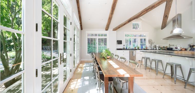 Kitchen and dining under barn beams